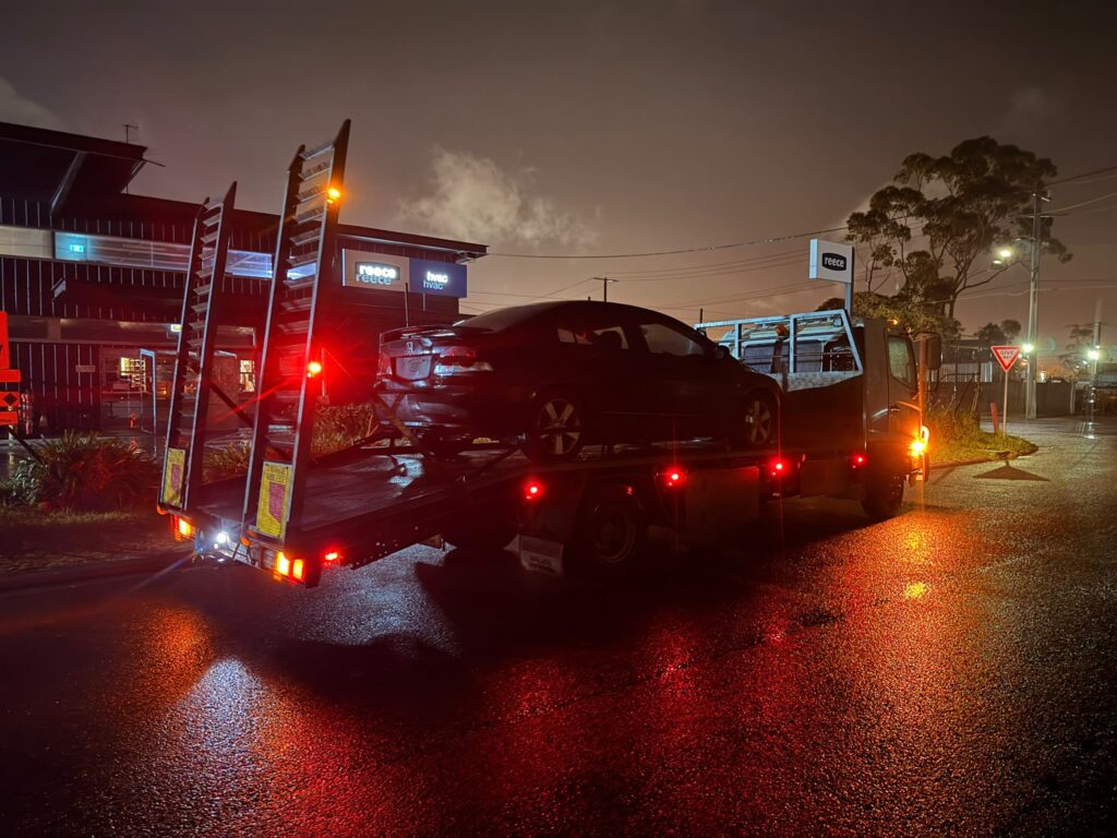 Unregistered car being collected by Roo's Car Removal in Geelong